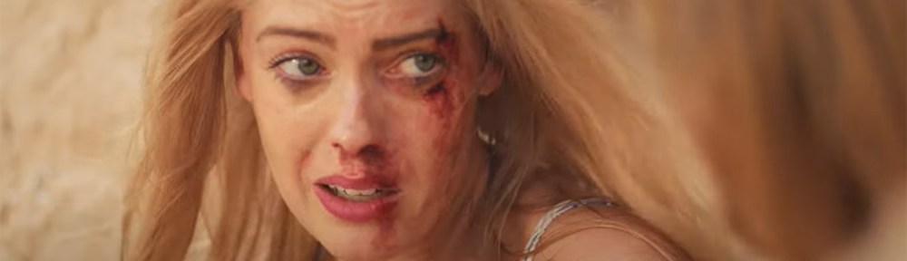 A woman covered in blood.