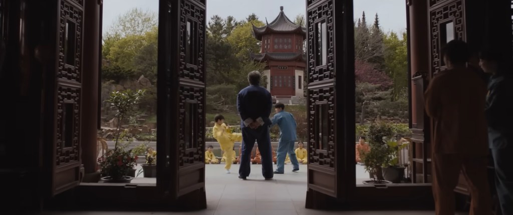 Mr Han looks over sparing students. 