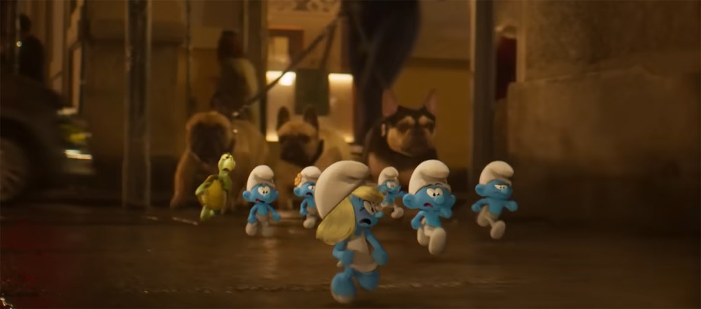 Smurfs run through Paris. 