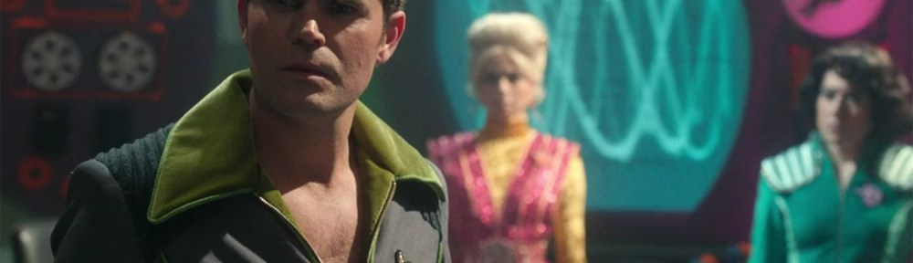 Standing on the bridge of the USS Adventure.