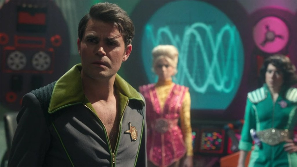 Standing on the bridge of the USS Adventure. 