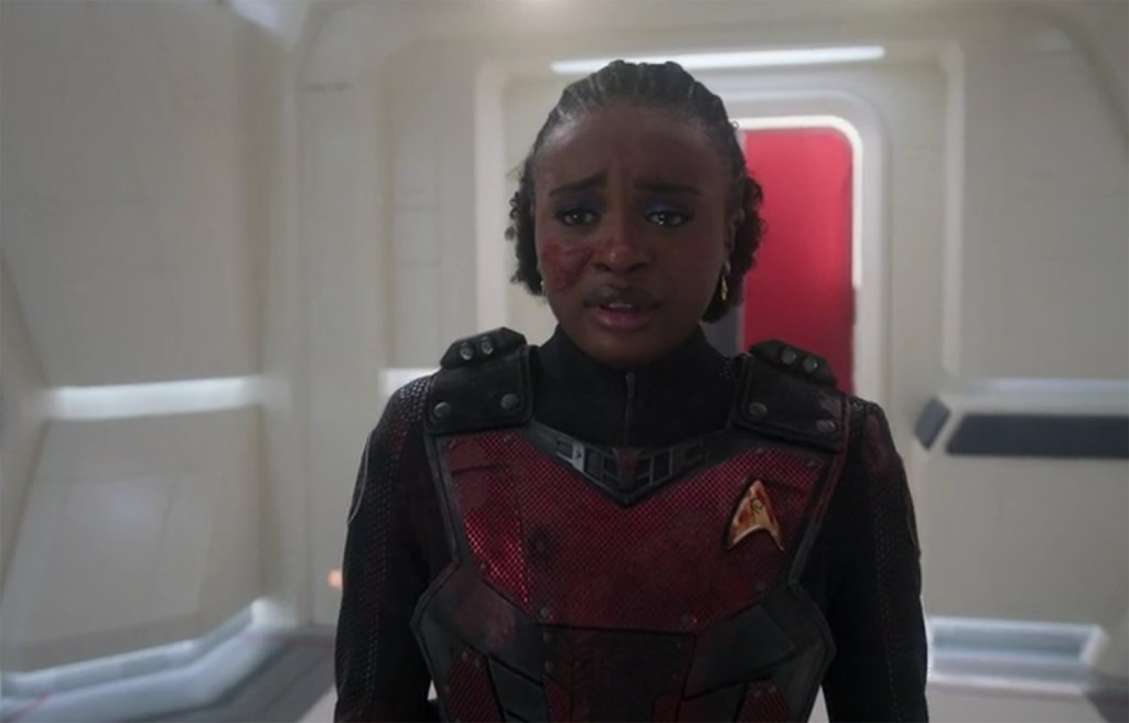 Uhura covered in blood from an away mission gone bad. 