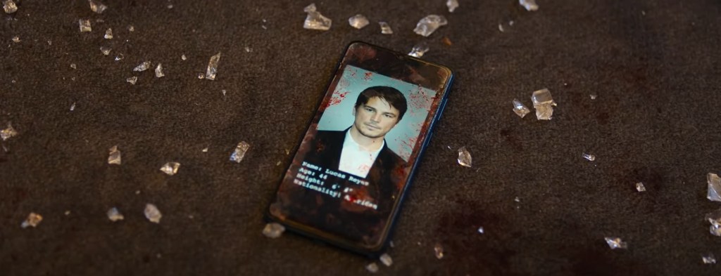 A phone with a bounty image of Josh Hartnett.