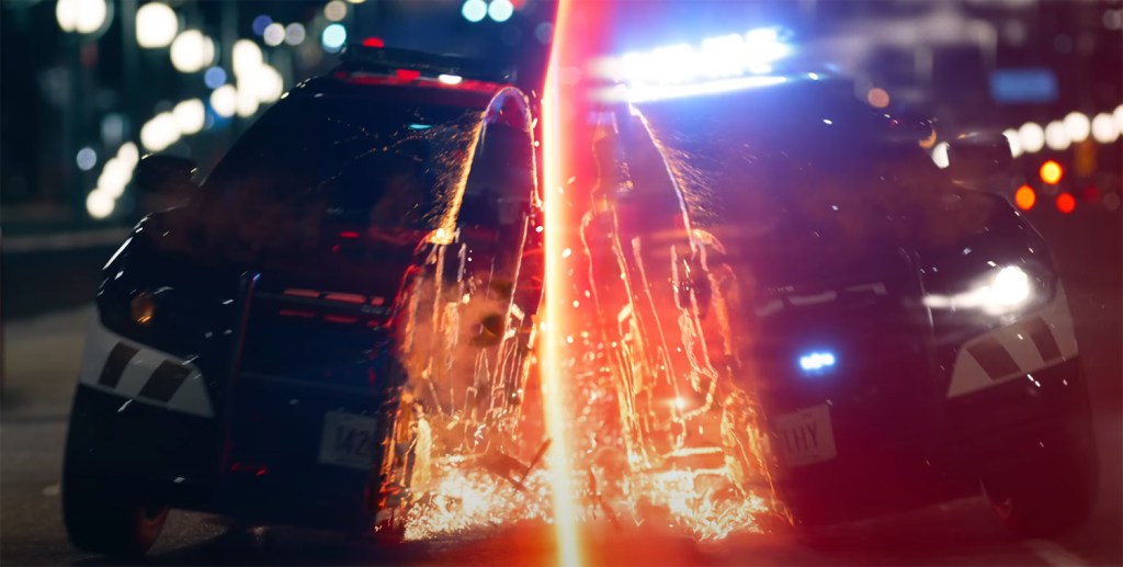 A car is sliced in two. 