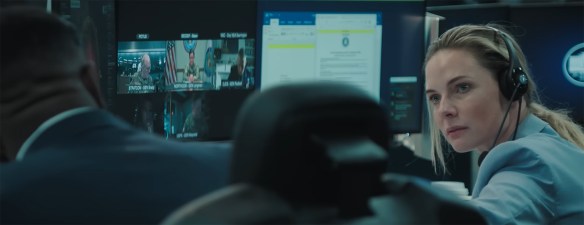 Rebecca Ferguson comforts her colleague. 