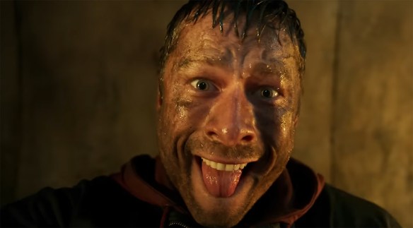 Glen Powell yelling at the camera. 