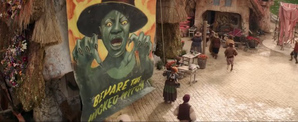 A propaganda poster of the Wicked Witch.