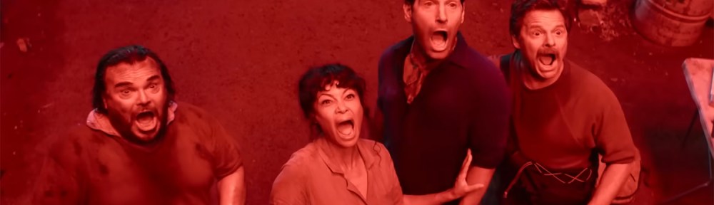 The cast screaming at a Anaconda bathed in red light.