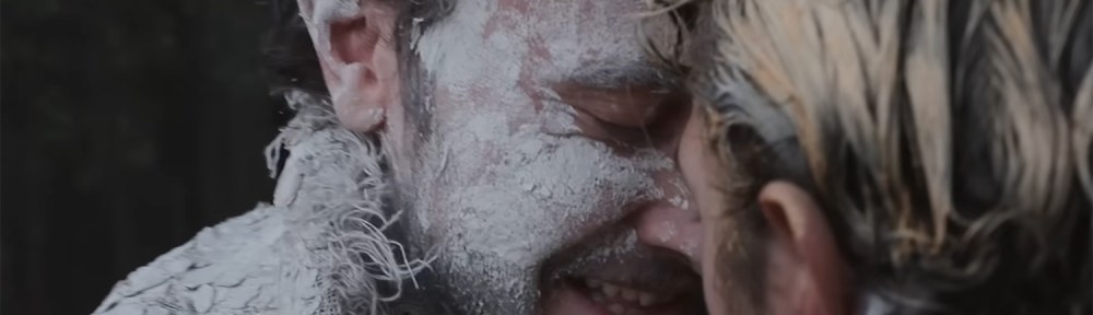 William embraces the actor playing Hamlet.