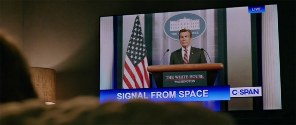 Not-President talking to Carol through the TV.