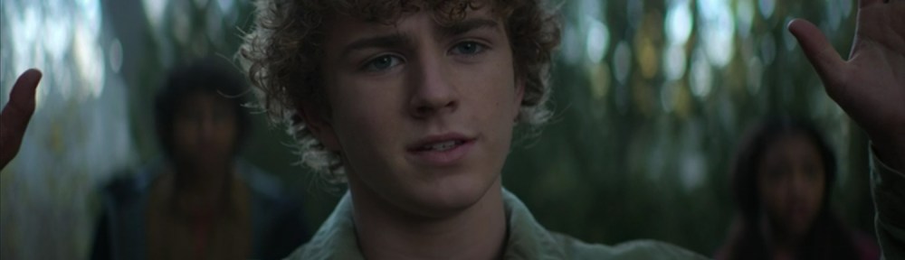 Percy with his hands up.