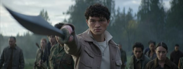 Luke raises a sword in combat. 