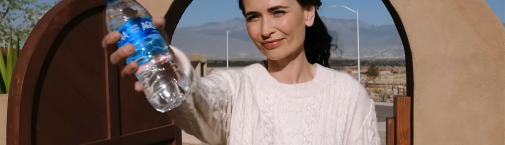 Zosia with a bottle of water.