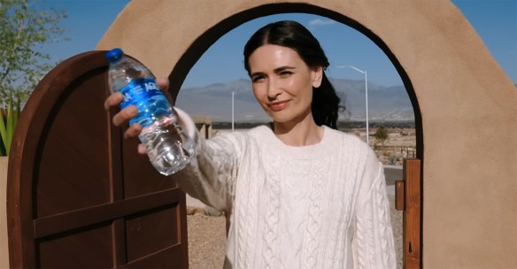 Zosia with a bottle of water.