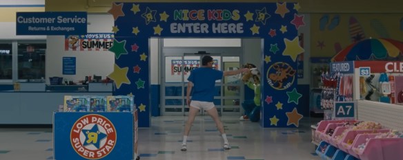 Channing Tatum dancing through a Toys R Us store