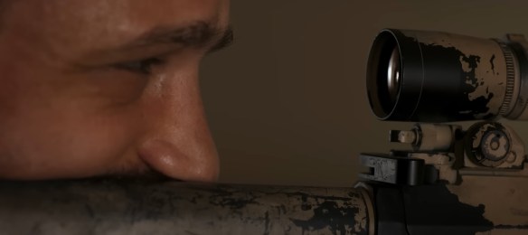 Looking down a sniper scope. 