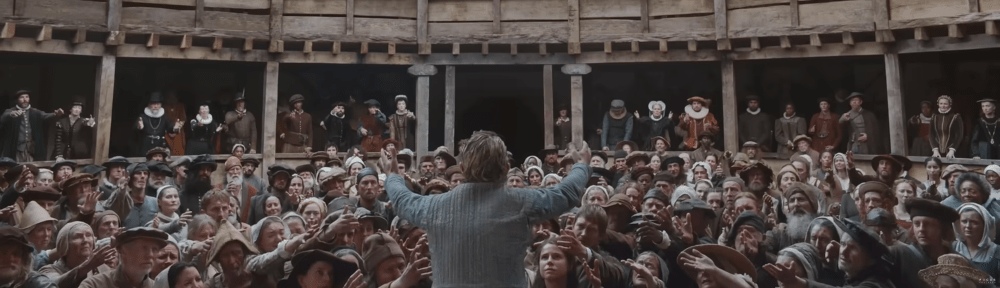 People reach out to Hamlet. Image Credit: Universal Pictures.