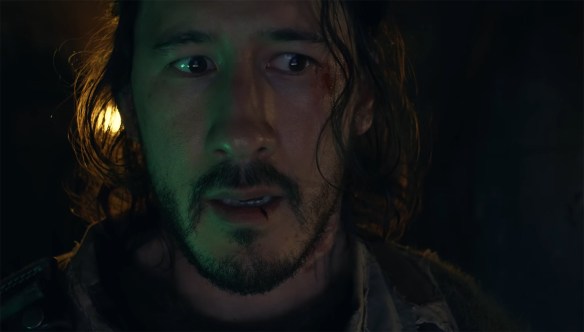 Simon looks out wondering what is out in the blood. 