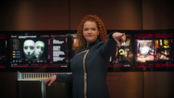 Sylvia Tilly pointing.