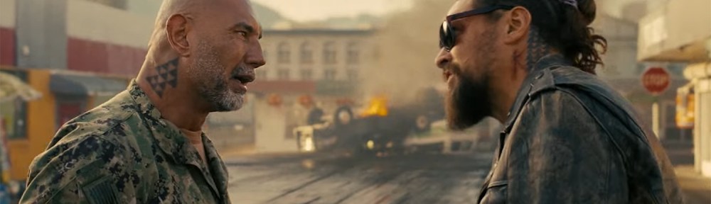 Johnny (Dave Bautista) and James (Jason Momoa) yelling at each other.