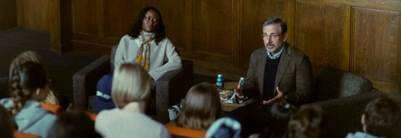 Greg gives a reading to the class. 