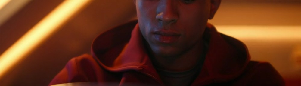 Caleb looking at messages from his mother.