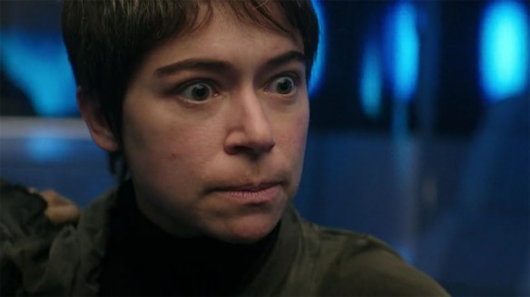 Anisha Mir (Tatiana Maslany) looks with anger. 