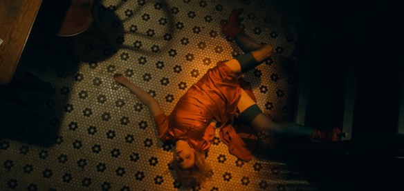 Ida dead at the bottom of some stairs. 