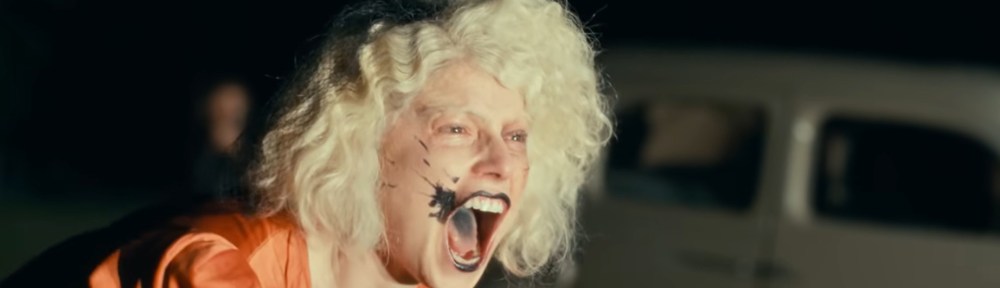 Jessie Buckley as The Bride screaming.