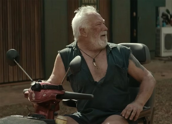 Steve Bisley on a mobility scooter.