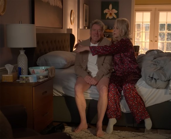 Lois hugs Hal without touching him.