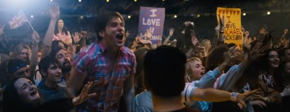 The crowd cheers for Michael.