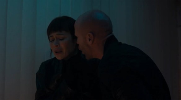 A man screams at a woman. 