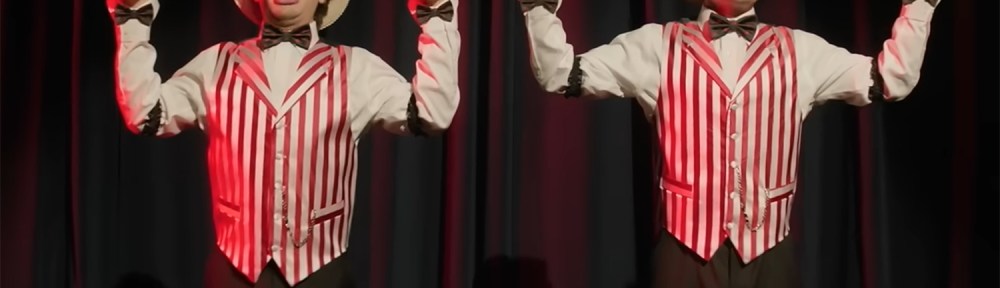 The guys on a drug trip dressed as a barbershop quartet, with singing heads instead of hands.