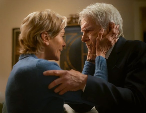 Paul and Julie embrace. 