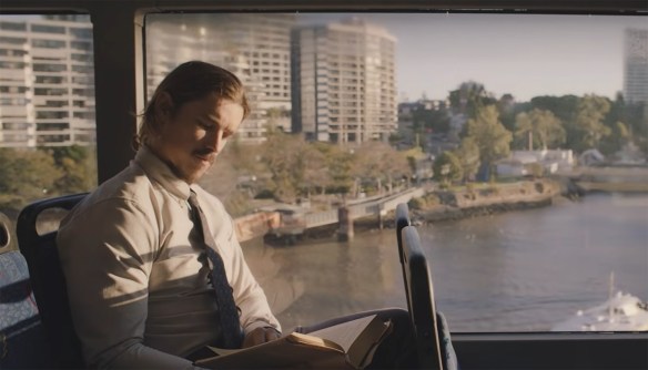Ryan reading on a bus. 