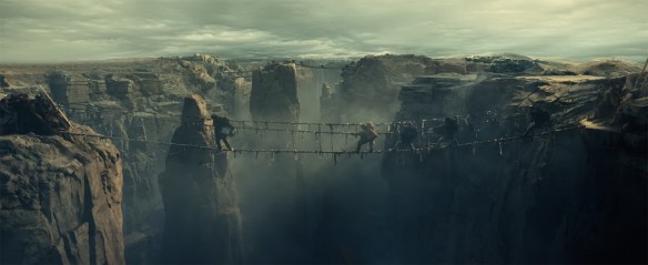The Garrity family escape over a ravine.