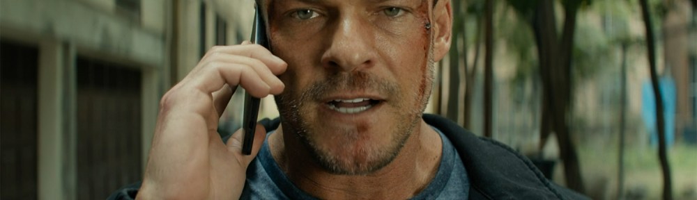Reacher getting bad news via a mobile phone.
