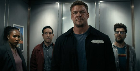 The gang in an elevator. 