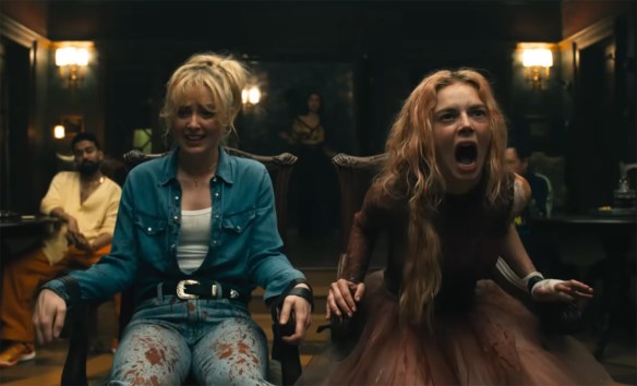 Samara Weaving screaming while being strapped to a chair with Kathryn Newton.