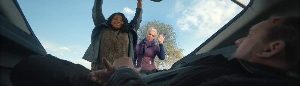 Octavia Spencer & Hannah Waddingham close the door of a car boot on a tied up individual.