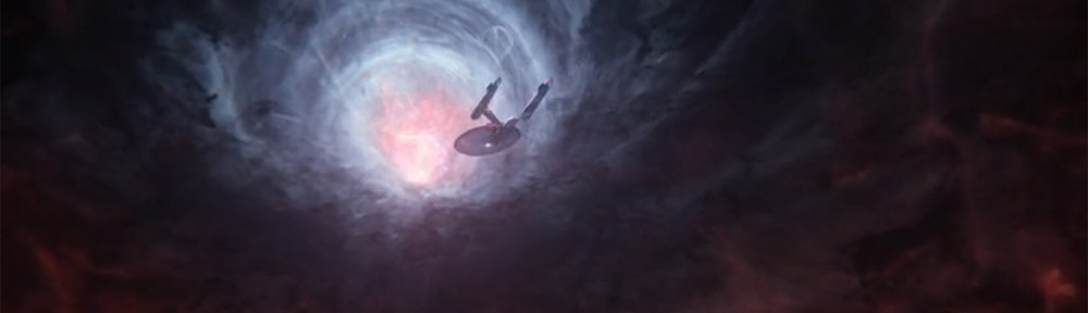The USS Enterprise being pulled into the slipstream wormhole.