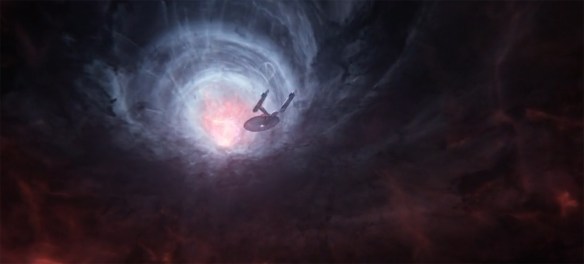 The USS Enterprise being pulled into the slipstream wormhole. 