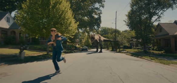 An Allosaurus chases Denise.
