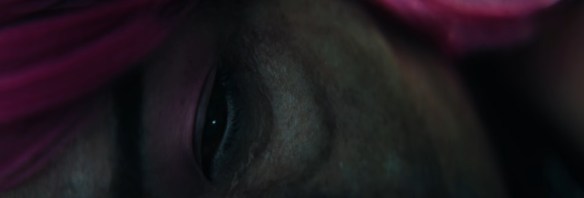 A zombie opens its eye. 