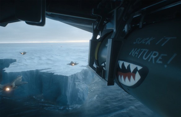 A bomb under a plane with the phrase 'suck it nature!' written on the side approaching an ice sheet.