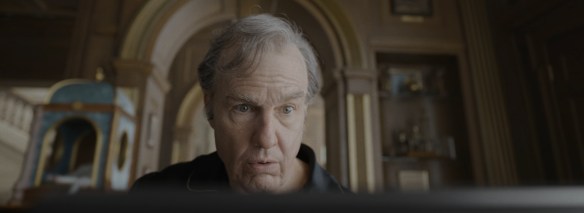 Digger looks in shock at the news on his computer screen.