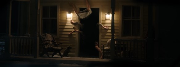 Hands and feet spall out from a door.