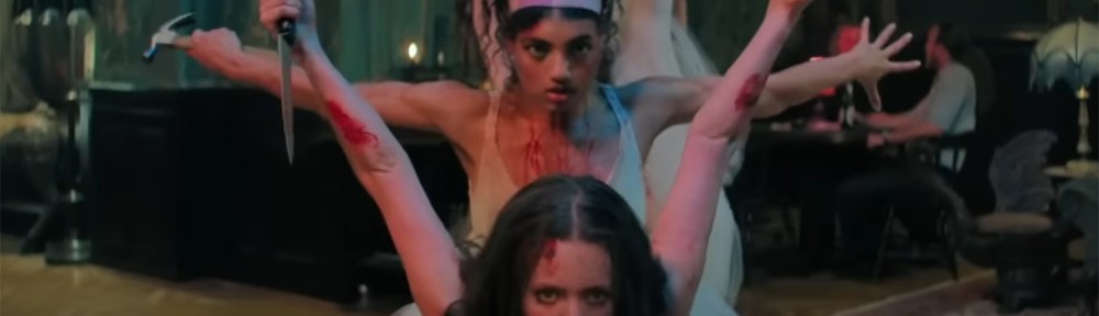 The ballerinas pose with weapons.