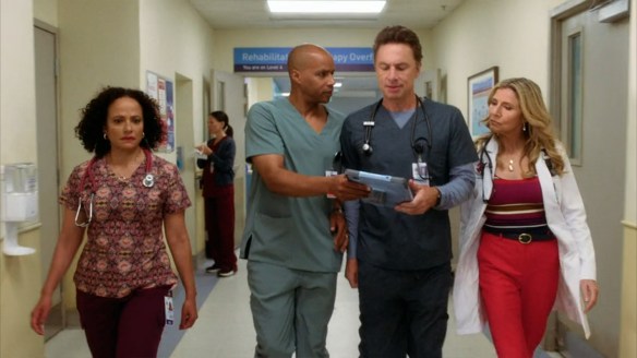 The gang walking down a hallway